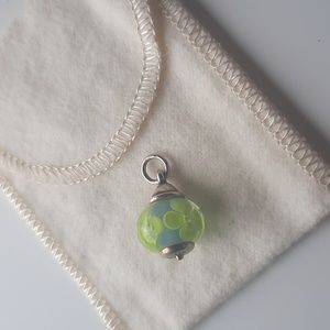 Retired James Avery blown glass charm